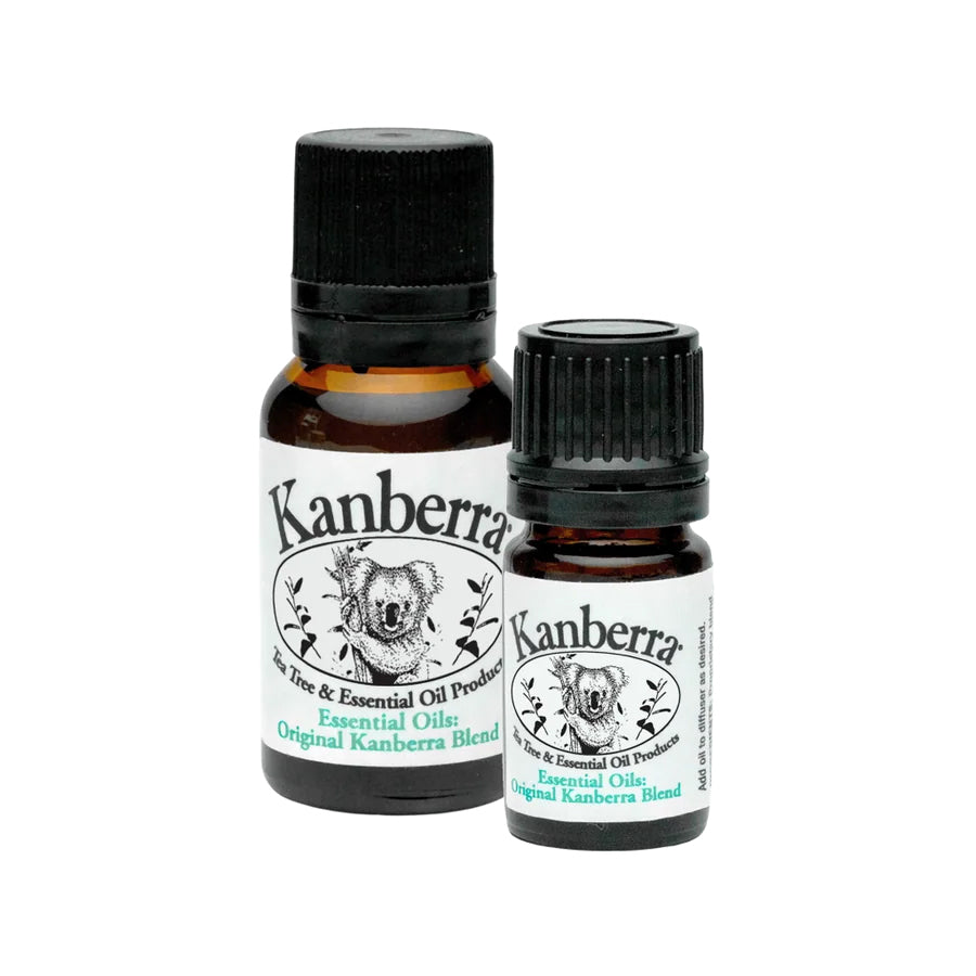 Two amber bottles of Kanberra Essential Oils Blend, featuring a koala and the label "Original Kanberra Blend." Certified Pure Australian Tea Tree Oil Blend for Diffusers, ideal for improving air quality.